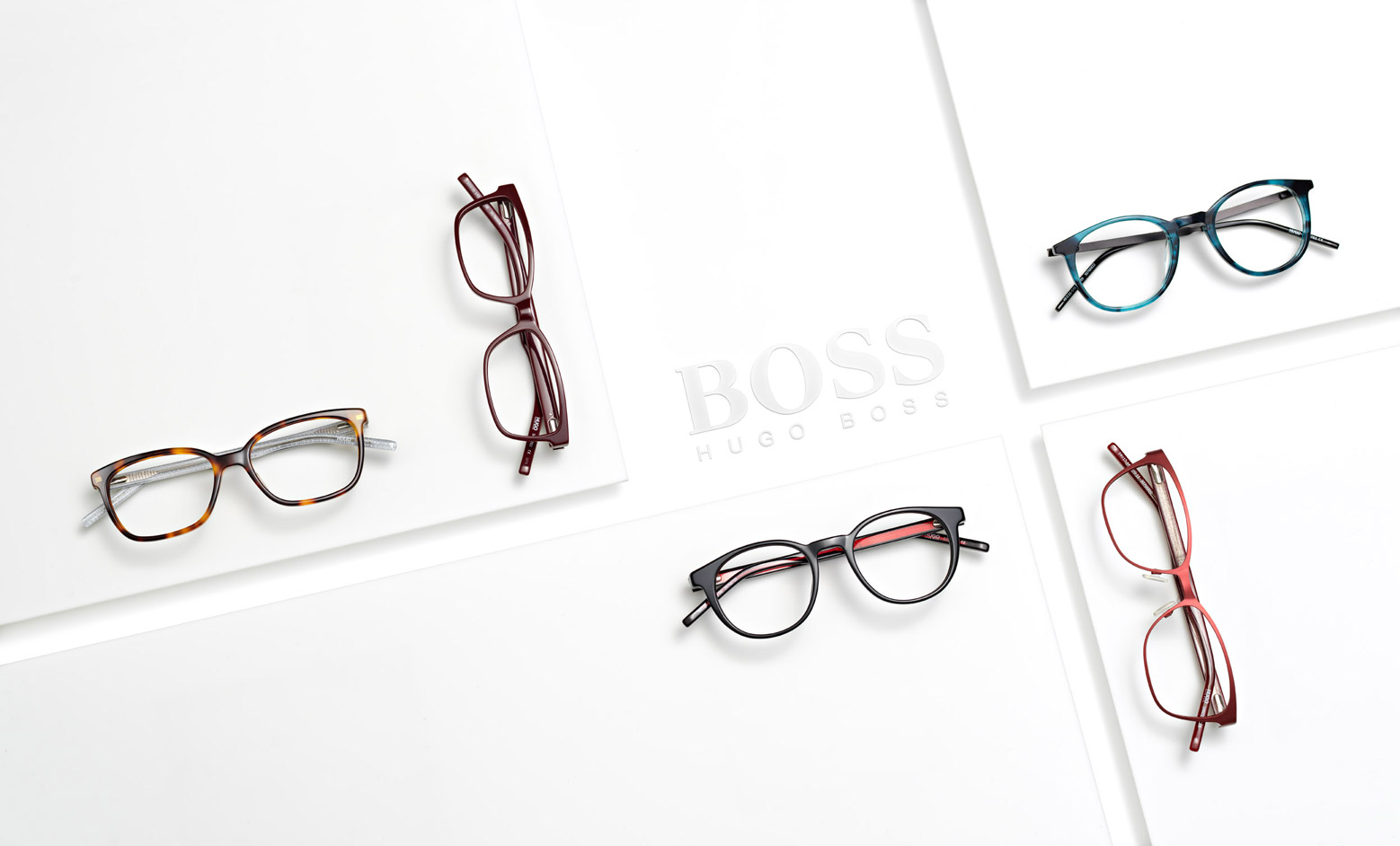 Flat lay image of Hugo Boss glasses on a white background